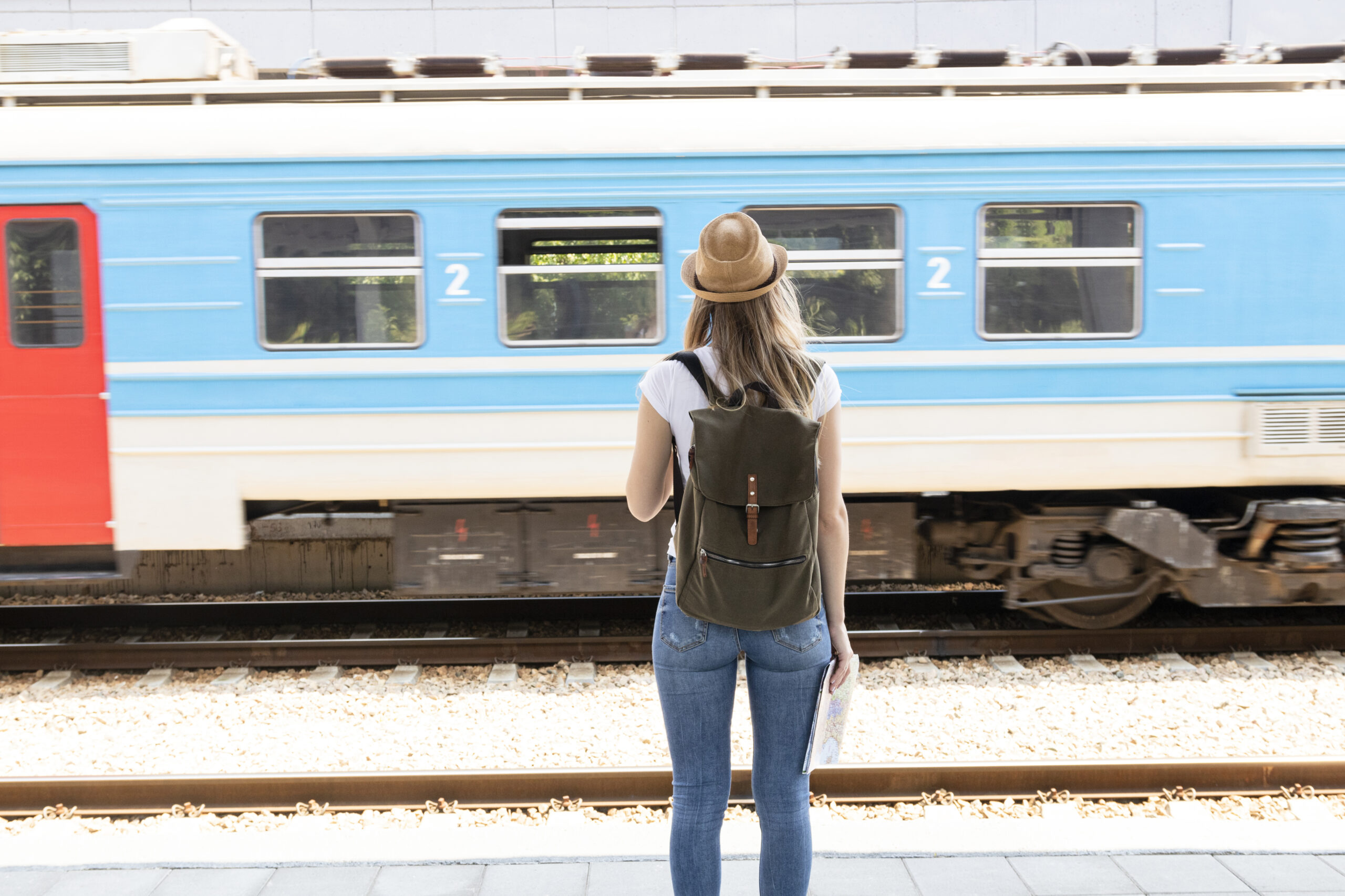 woman-looking-passing-train